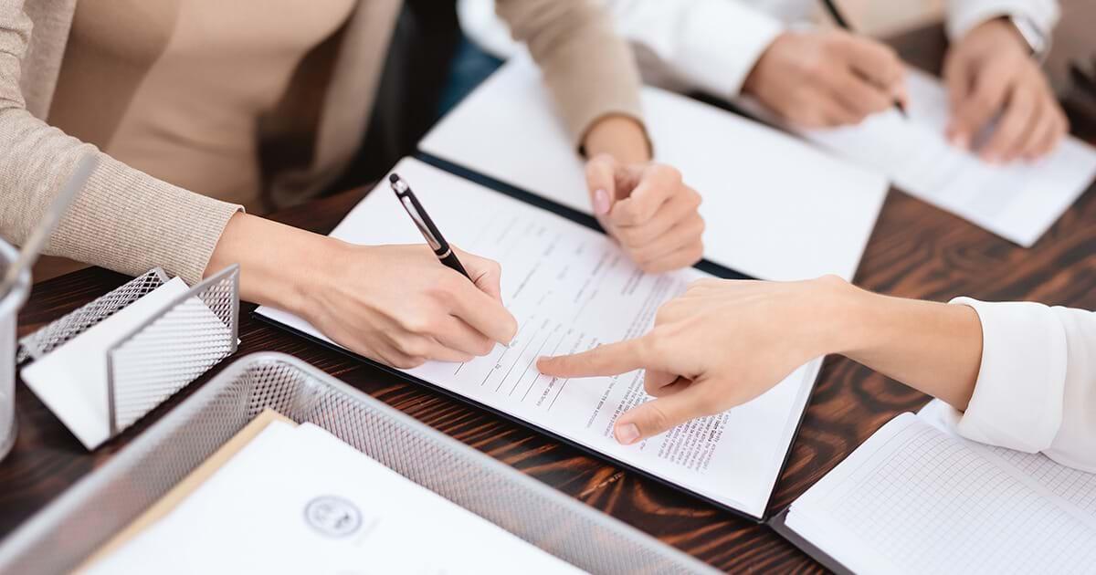 People reviewing documents during an appeals process