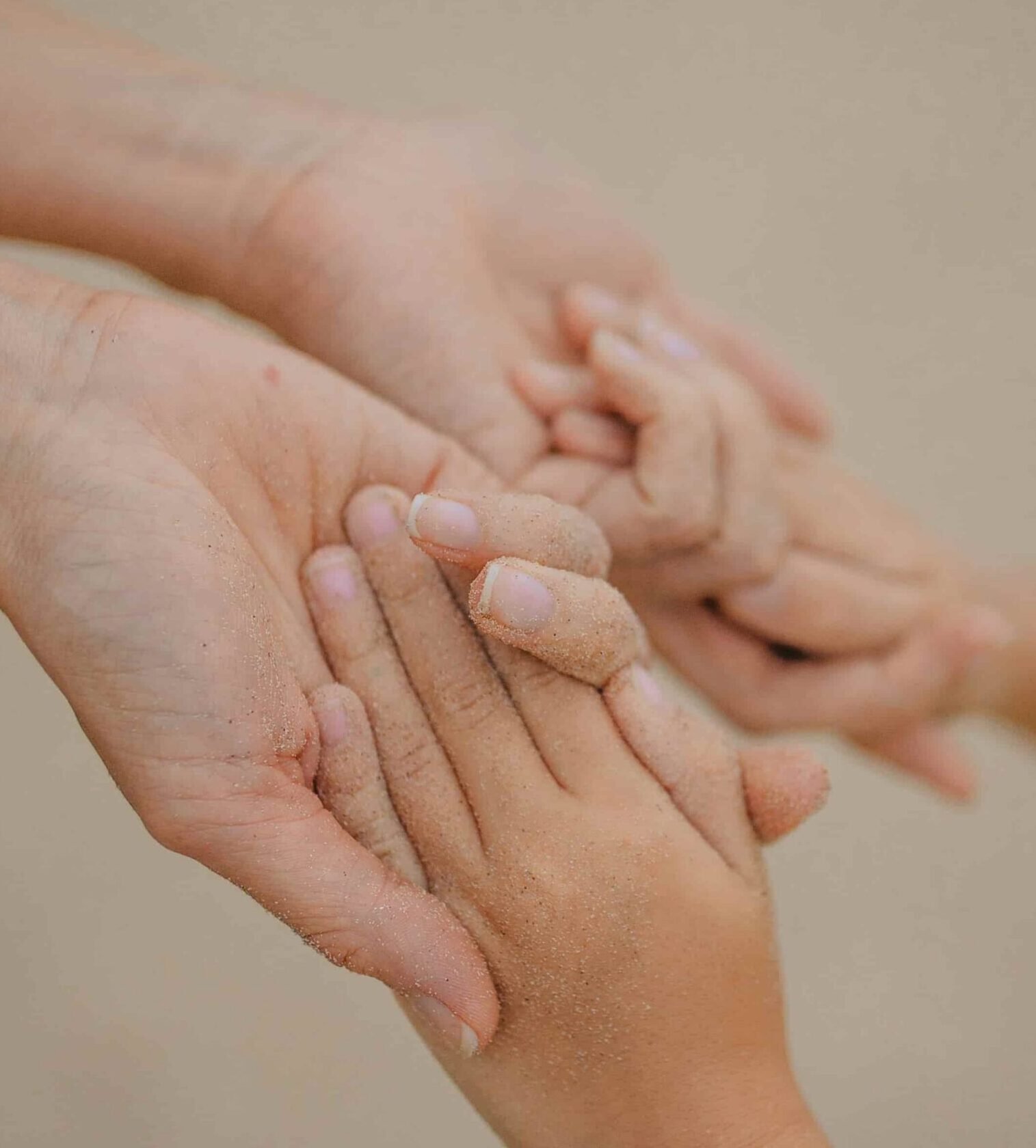 Close-up of multiple hands holding each other